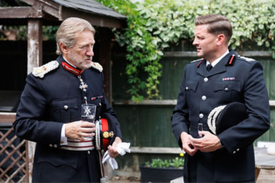 His Majesty’s Lord Lieutenant of Hertfordshire, Robert Voss CBE CStJ, and his deputy engaged in conversation during a formal event