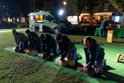 Residents practice CPR training skill